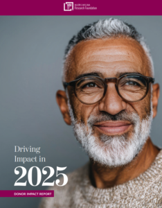 The cover of the MMRF's 2025 Donor Impact Report features a middle-aged man with silver hair smiling while looking off to the righthand side